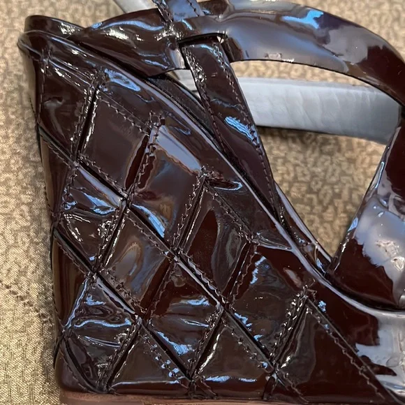 Valentino wedges in an eggplant color size 6 1/2 amazing condition
